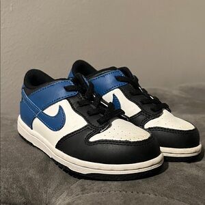 Nike Kids' Black and White Sneakers with Blue Accents